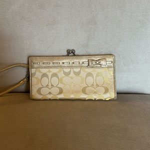 Coach Gold Embossed Fabric Clutch (NWOT)